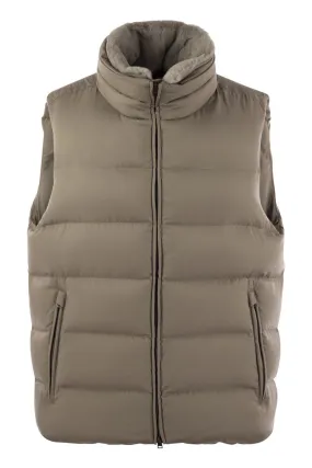 DOWN-FILLED WAISTCOAT WITH FUR INSERT